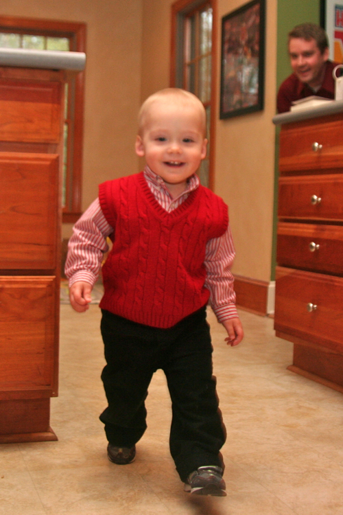 walking in a red vest